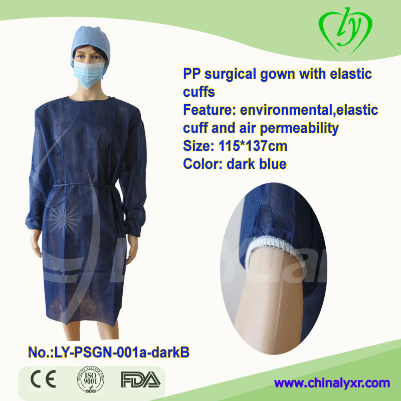 Vestido de aislamiento no tejido desechable del vestido quirúrgico azul oscuro PP con puños elásticos