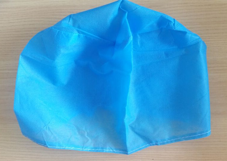 Single Layer Nonwoven Surgical Cap with Elastic Bar