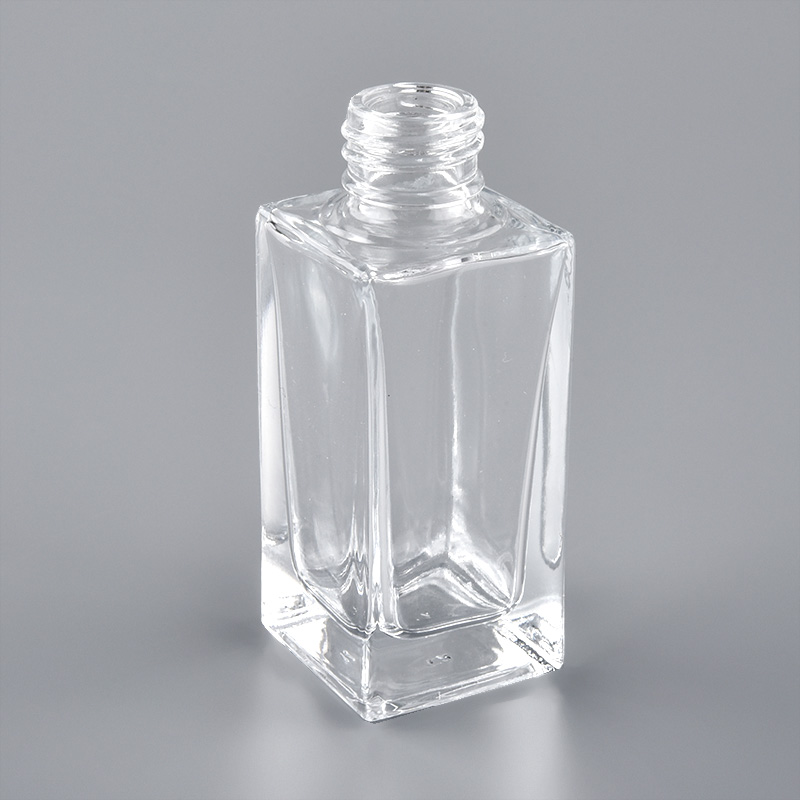 Frasco de perfume de vidrio vacío cuadrado transparente de 100 ml