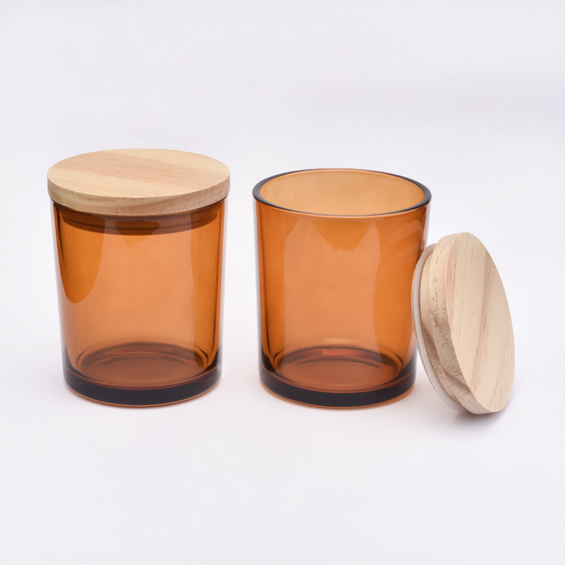 Portacandele in vetro marrone ambra con coperchi in legno