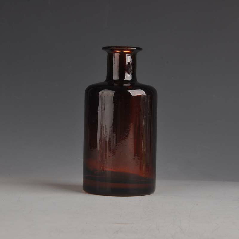Brown glass essential oil bottle