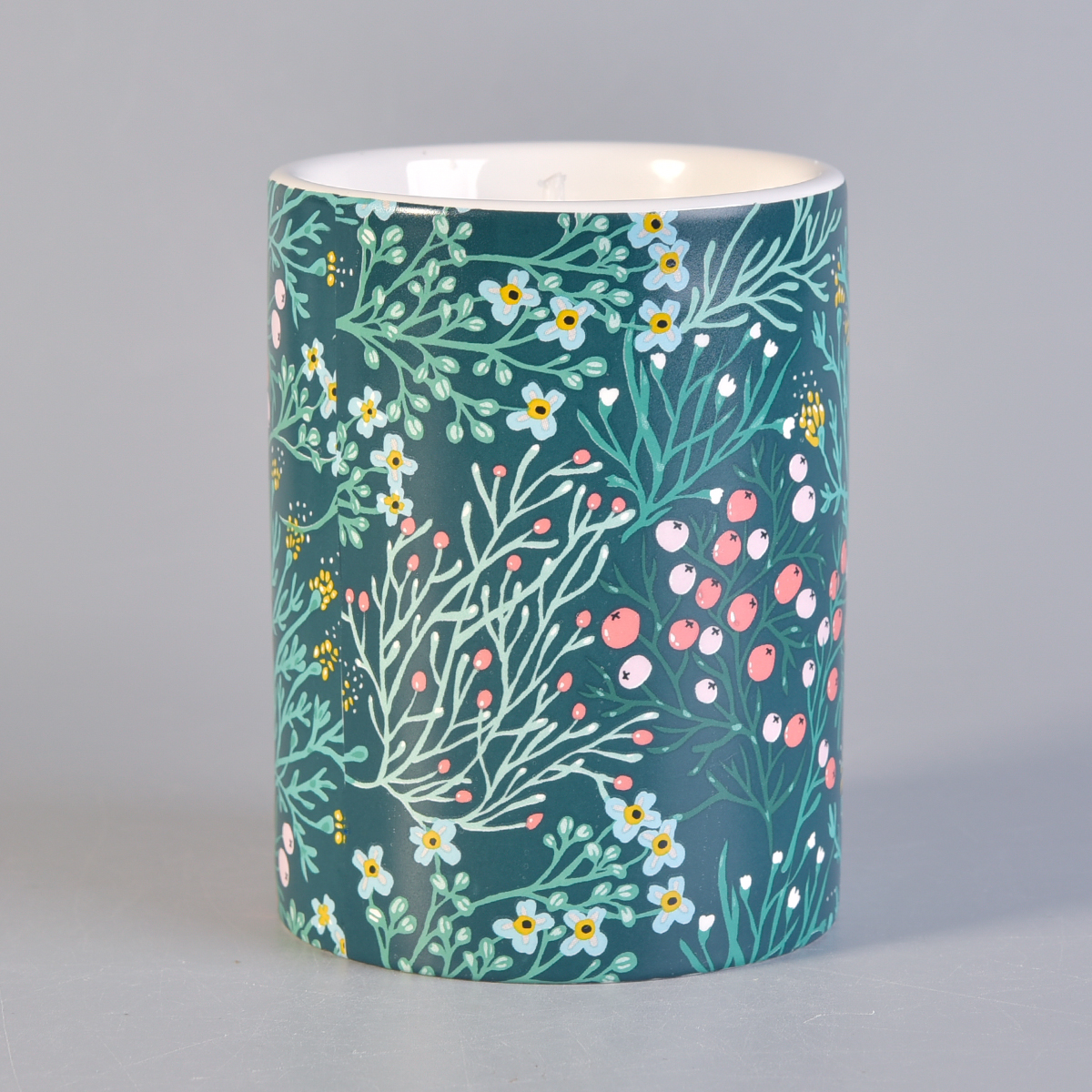 Ceramic candle holder with coloful print