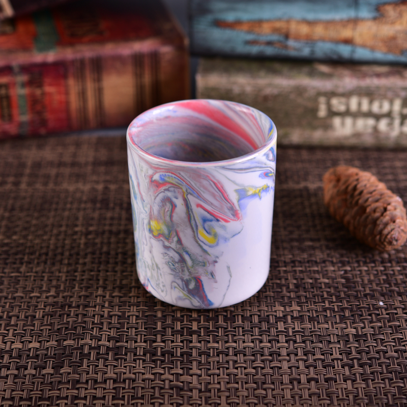 Suporte de vela cerâmica com padrão colorido