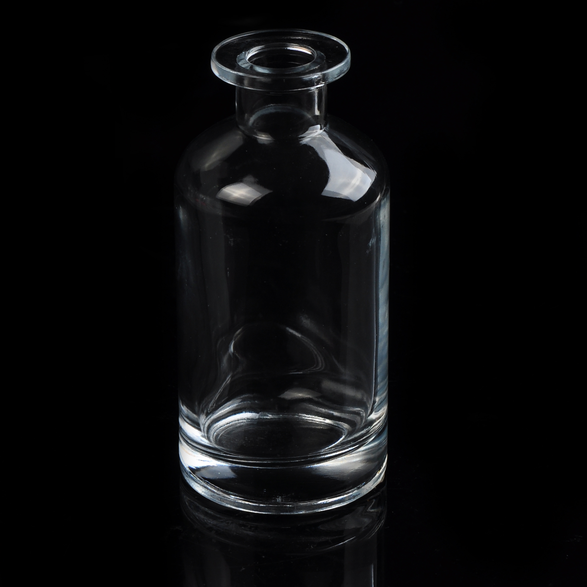 Botella de perfume de vidrio transparente