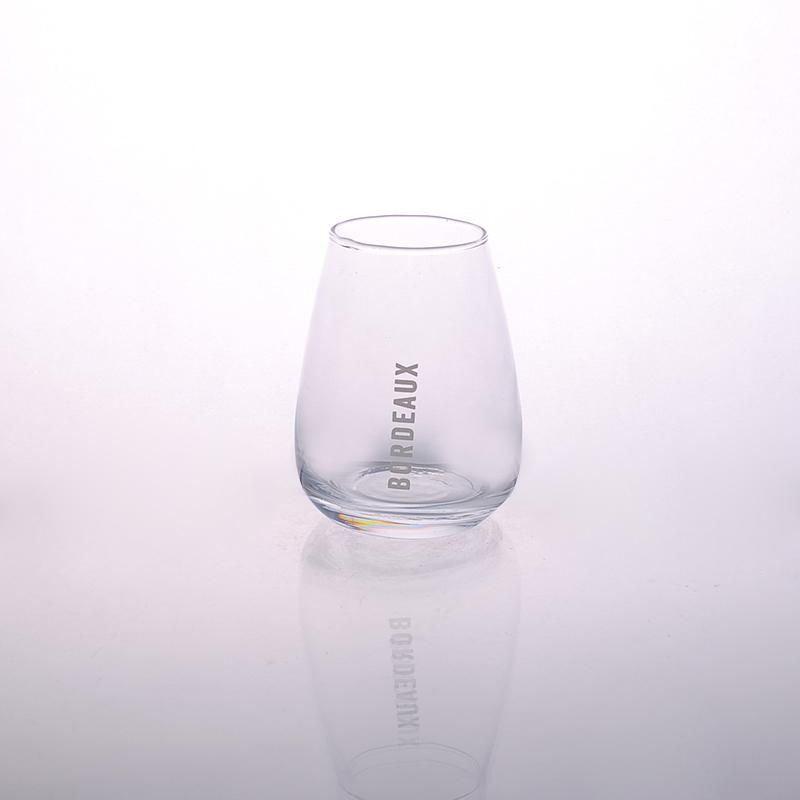 Clear stemless juice glass wine glass