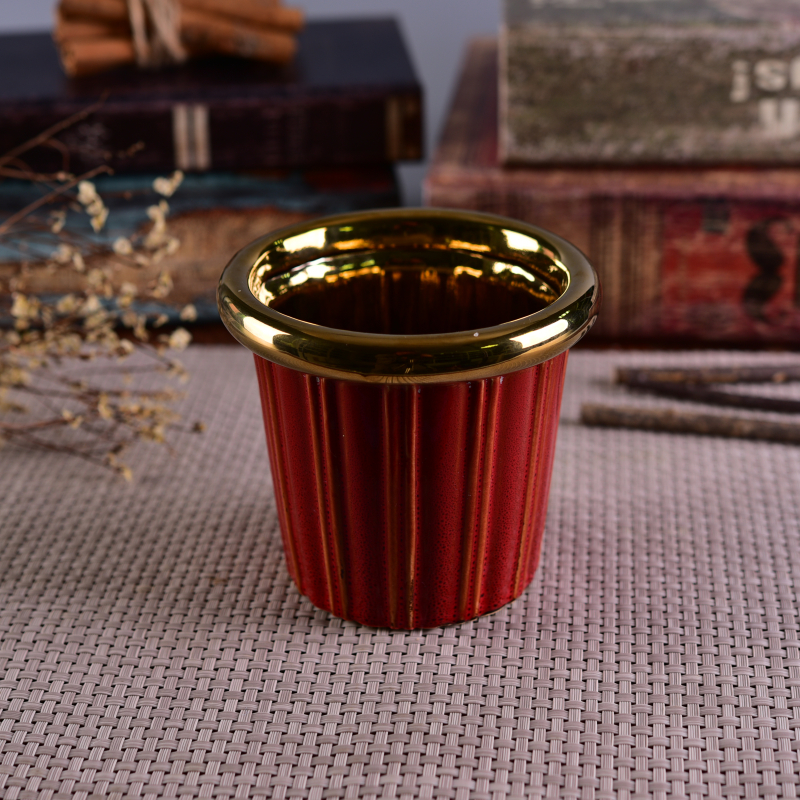 金色口部红色釉陶瓷蜡烛罐子
