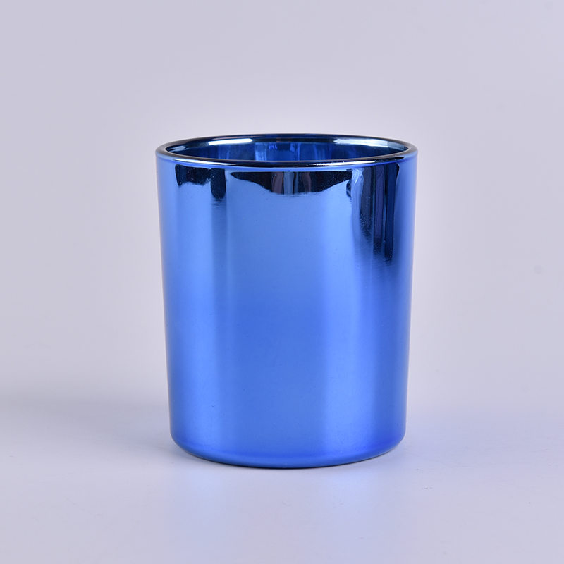 Eletroforese brilhando jarra de vela de vidro azul