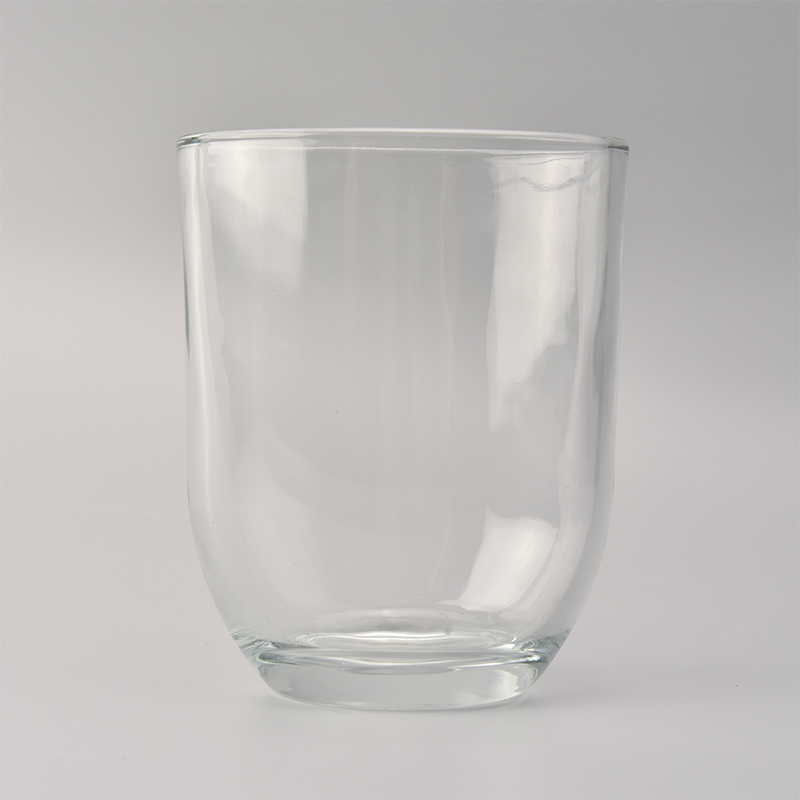 Eliptyczny, przezroczysty szklany świecznik
