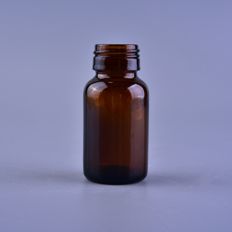 Vuoto piccolo ambra bottiglia di medicina di vetro