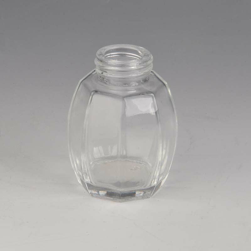 Football shape glass essential oil bottle