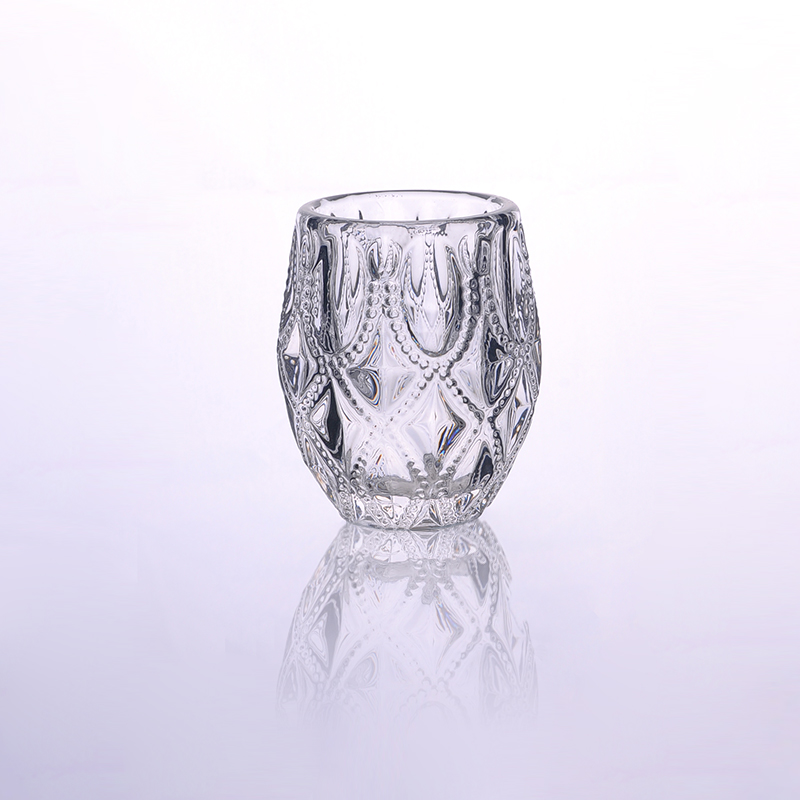 Glass candle holder with engraved