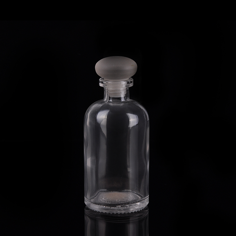 Botella de aceite de vidrio con tapa