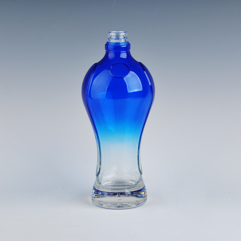 glass wine bottle with blue spray color