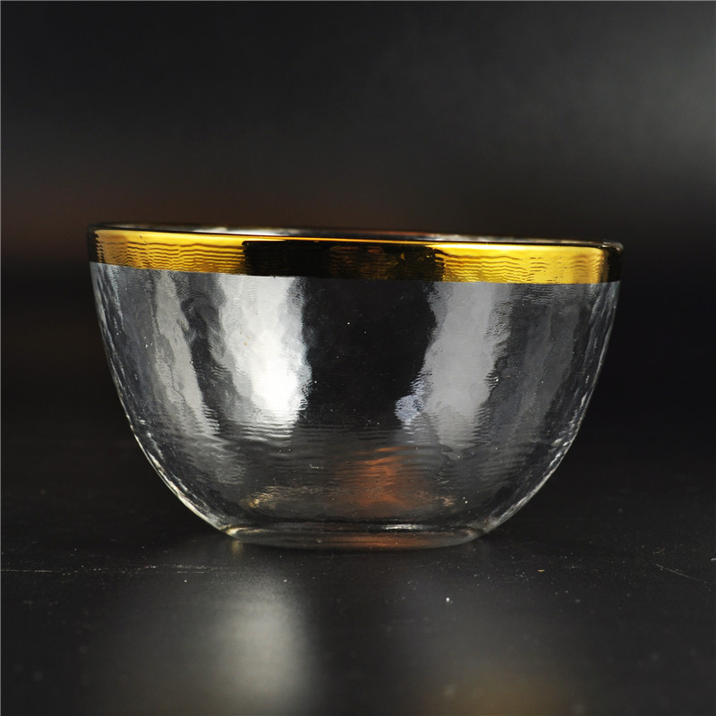 bord d'or contenant de bougie en verre imprimé