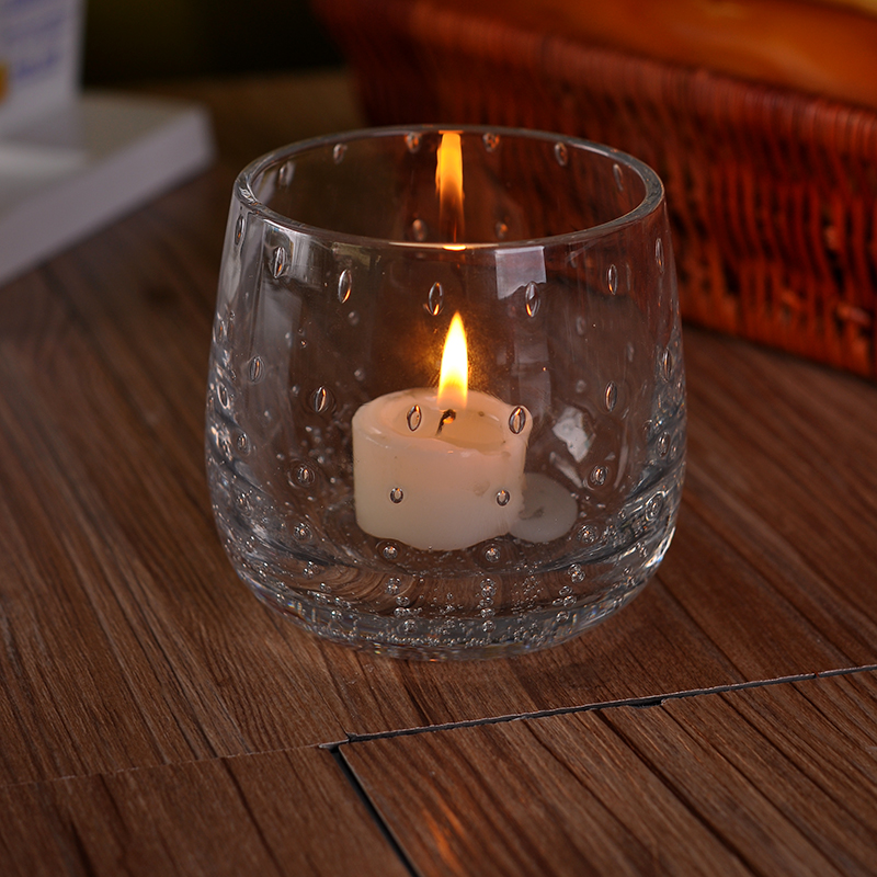 Handmade candle holder with small bubble inside