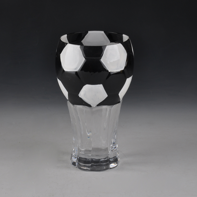 Martini glass with football painted