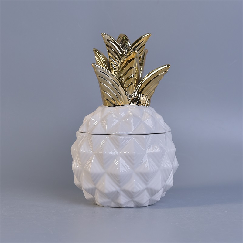菠萝陶瓷蜡烛瓶与家庭或婚礼装饰的叶子盖