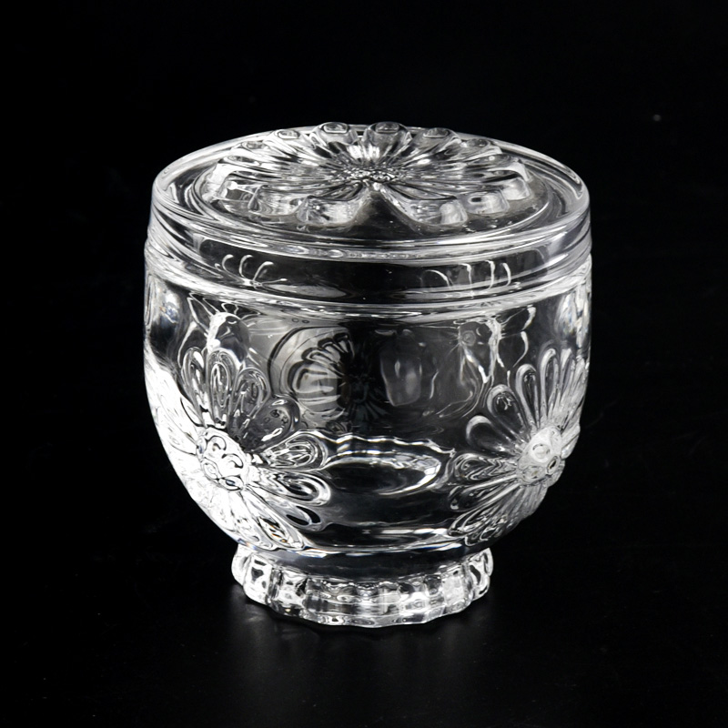 Popular clear glass flower pattern candle jar with lid supplier