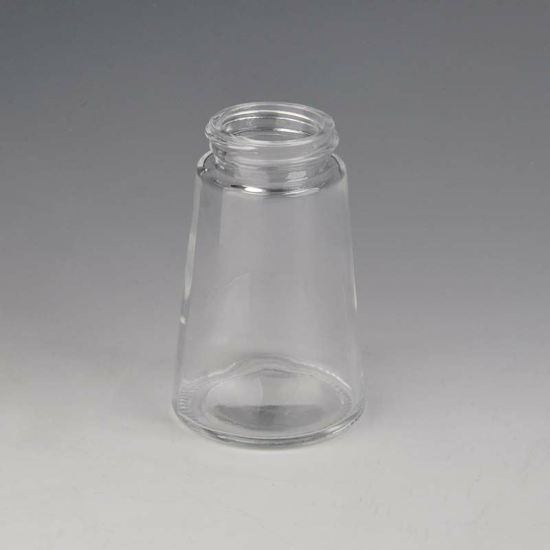 Botella de aceite esencial de vidrio transparente redonda