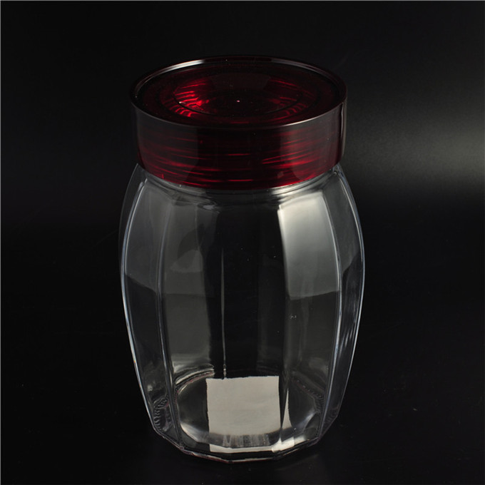vaso di vetro rotondo con coperchio di colore