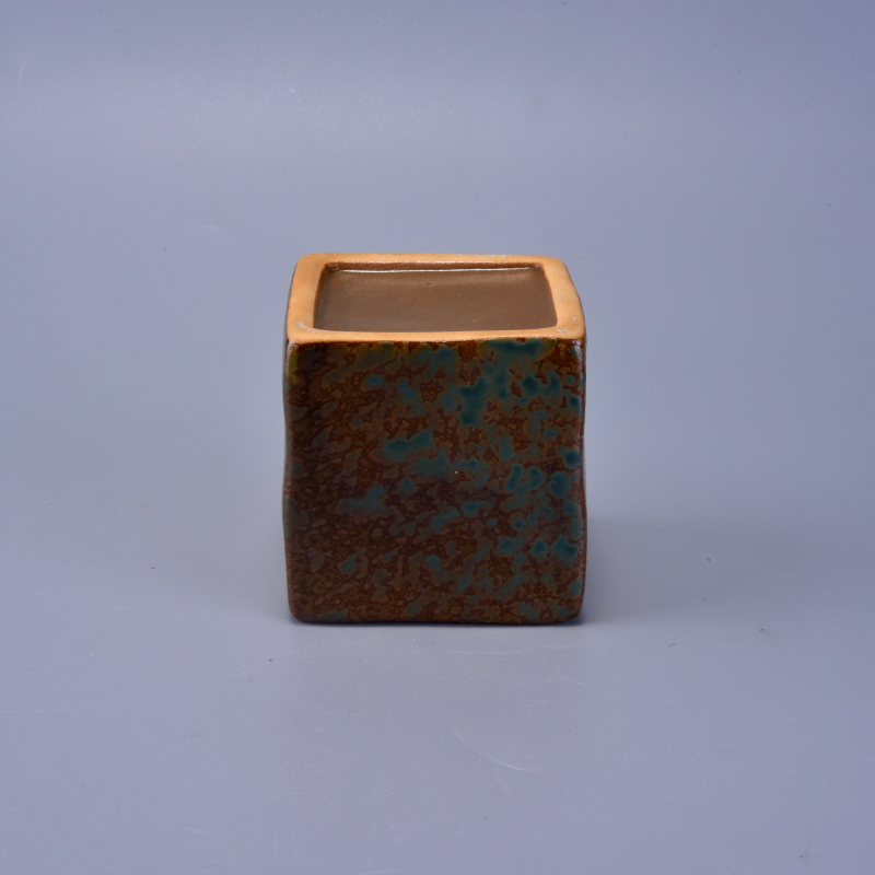 Square ceramic candle holder with transmutation glaze finish