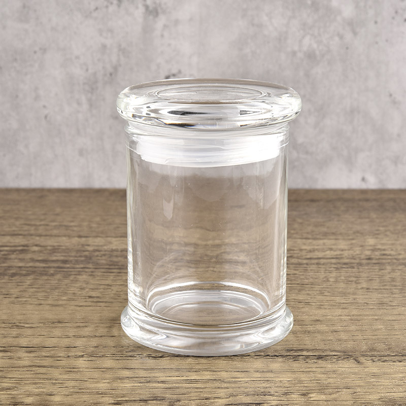 Trasparente vaso di candela di vetro con gli occhiali coperchio