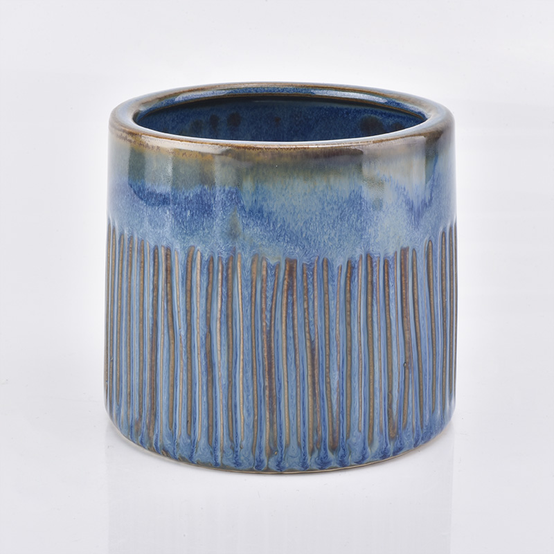 blaues antikes Keramikkerzenglas