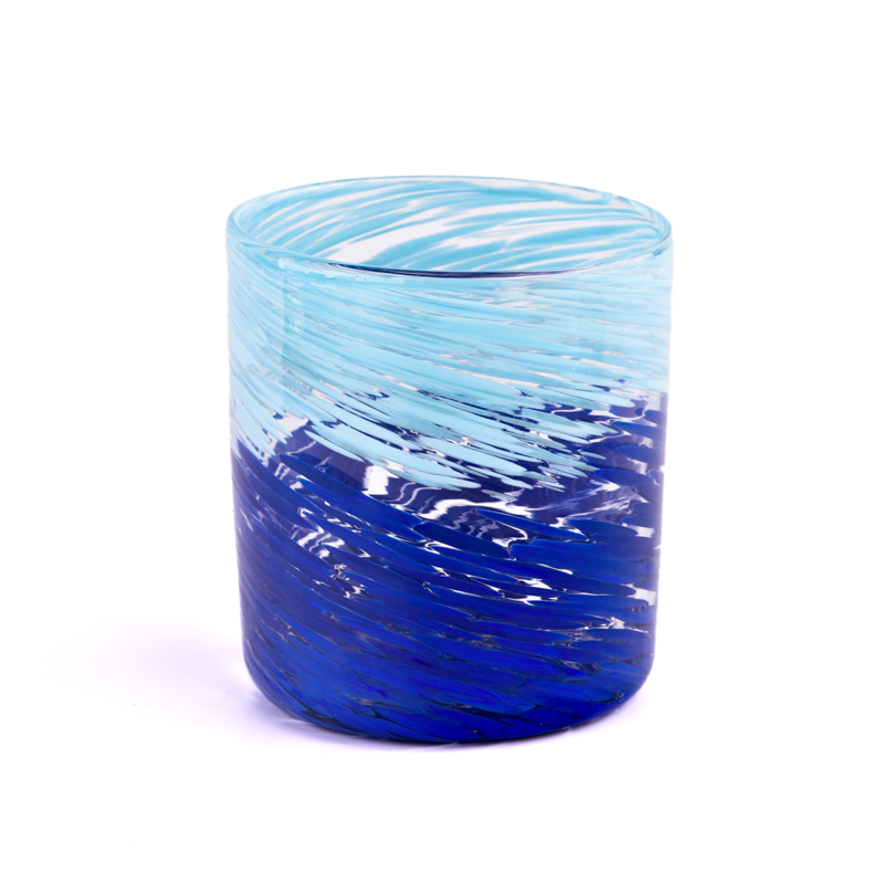 blue glass candle vessel hand colorful candle jars