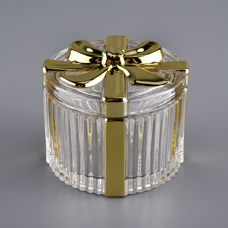 diseño de bowknot vaso de vela de vidrio dorado con tapa