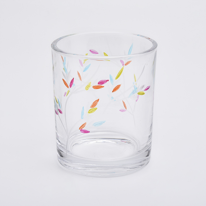 frascos de vela de vidrio con diseños de grabado en varios tamaños