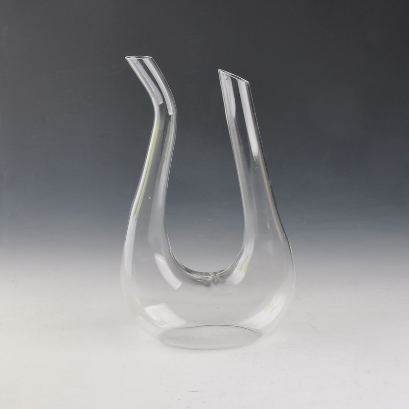 crooked transparent glass decanter
