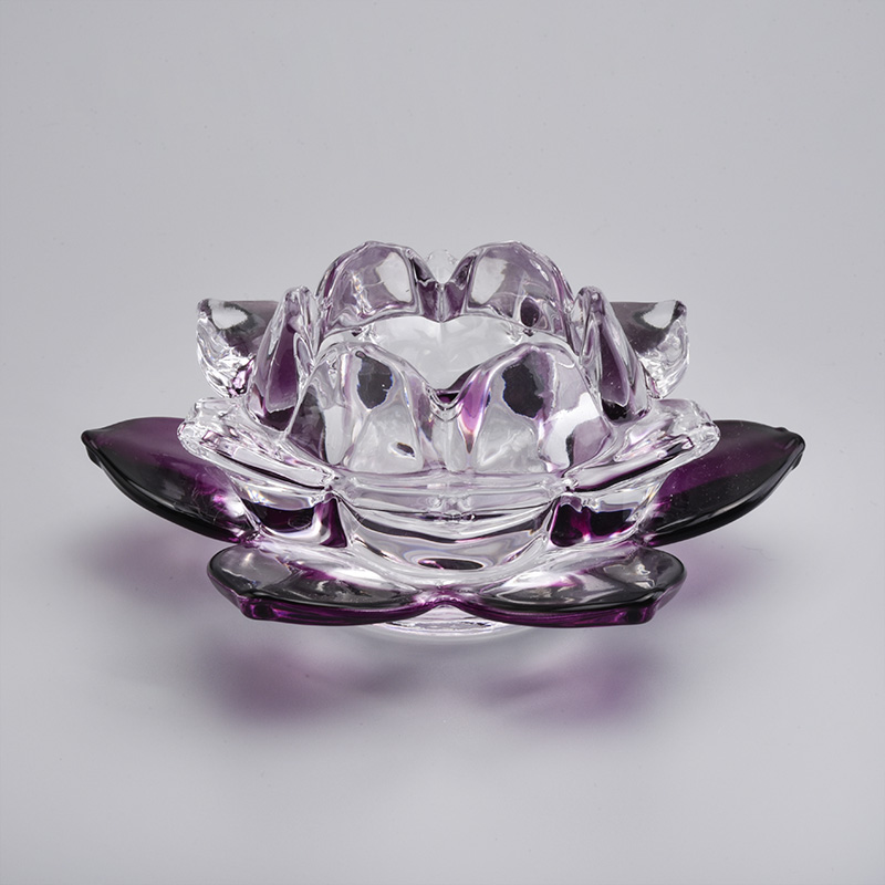 portavelas de vidrio con forma de flor en violeta