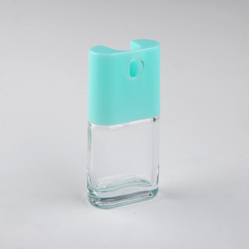 glass perfume bottle with bule lid