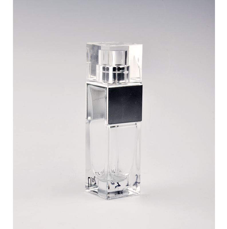 Frasco de perfume de vidro com tampa transparente