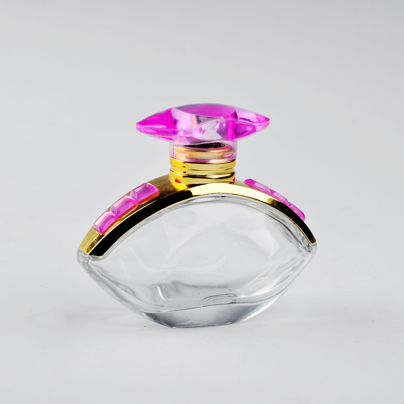 glass perfume bottle with pink lid