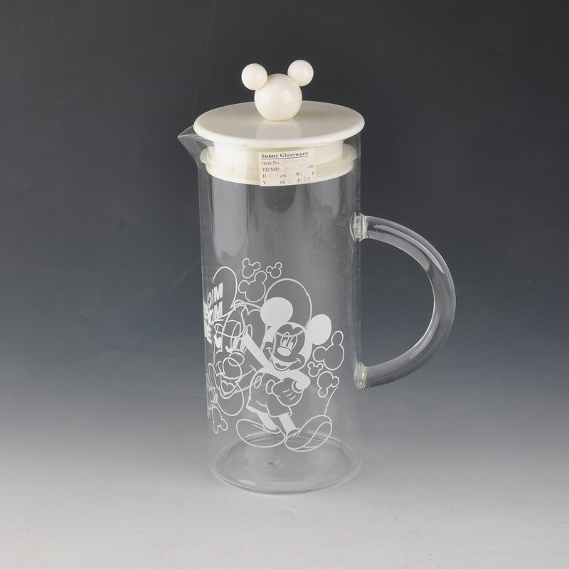 glass water jug with white lid