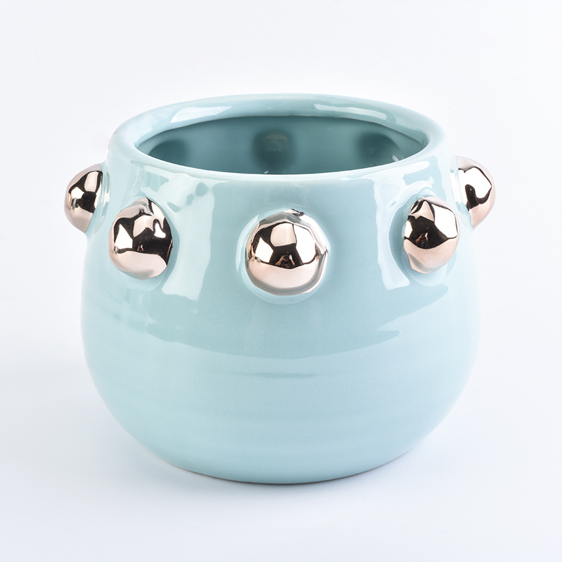 Glänzend blau glasiertes Keramikkerzenglas mit Hobnail