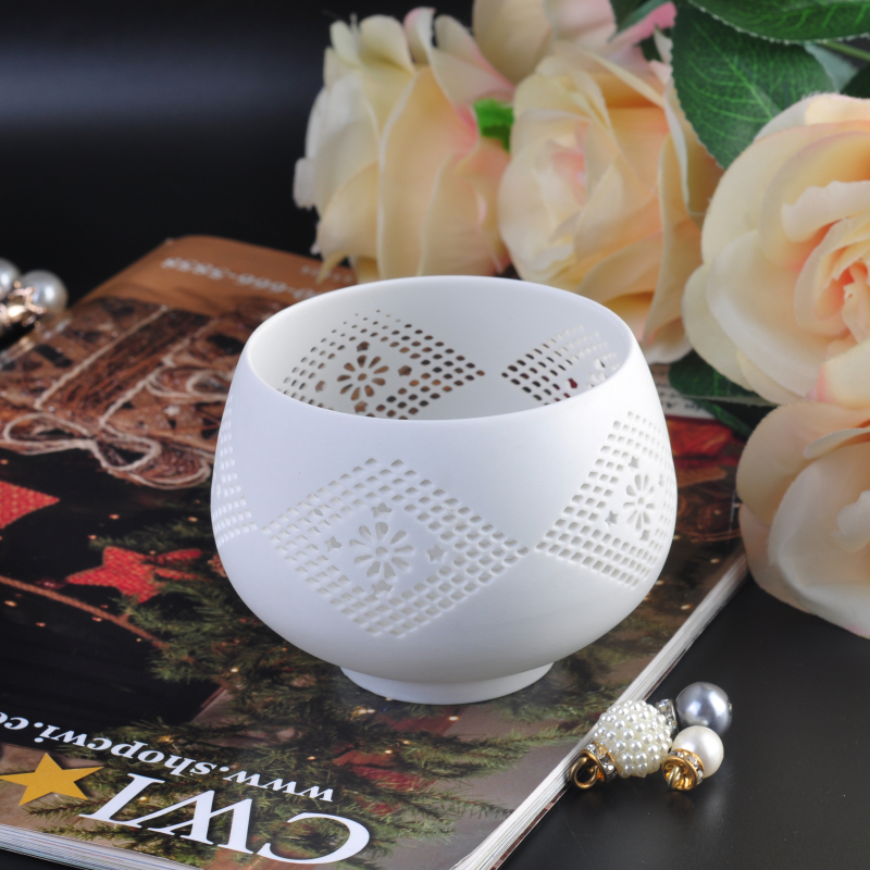 matt white ceramic candle bowl with hollow pattern