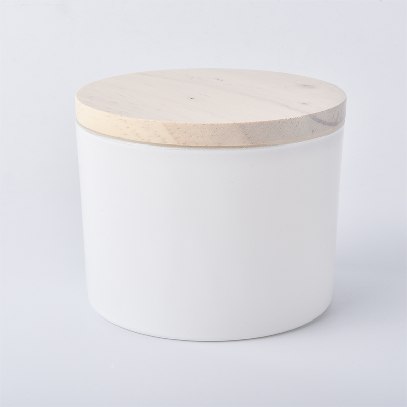 matte white glass candle container with wooden lid