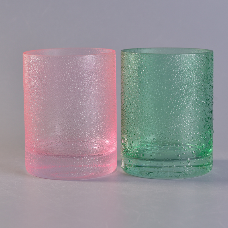 tarro de vela de vidrio rosa con efecto de punto