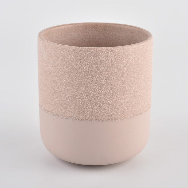 粉红色粗糙和光滑的陶瓷蜡烛罐