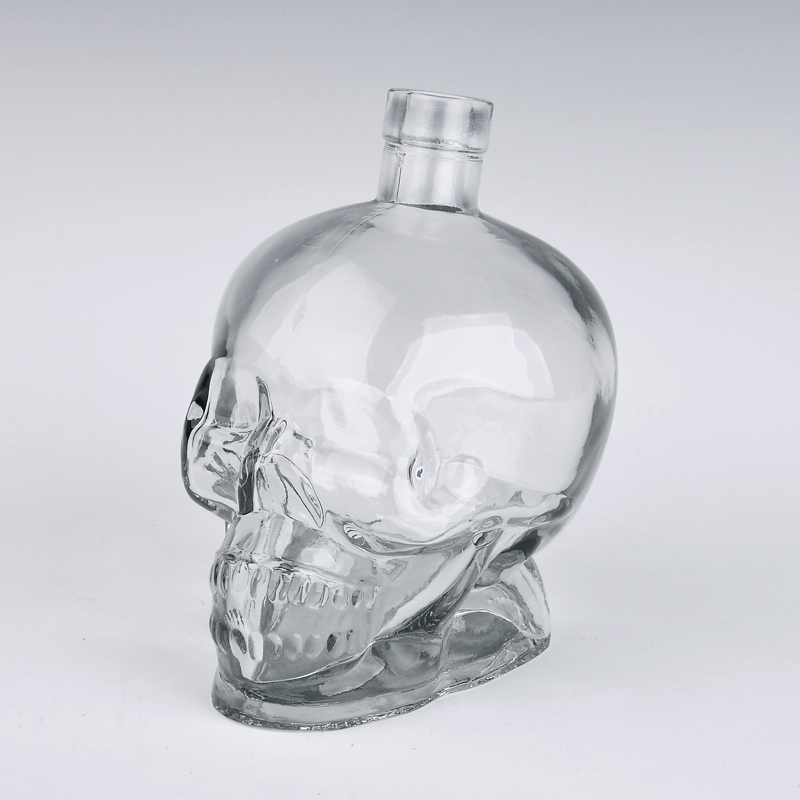 skull shape glass perfume bottle