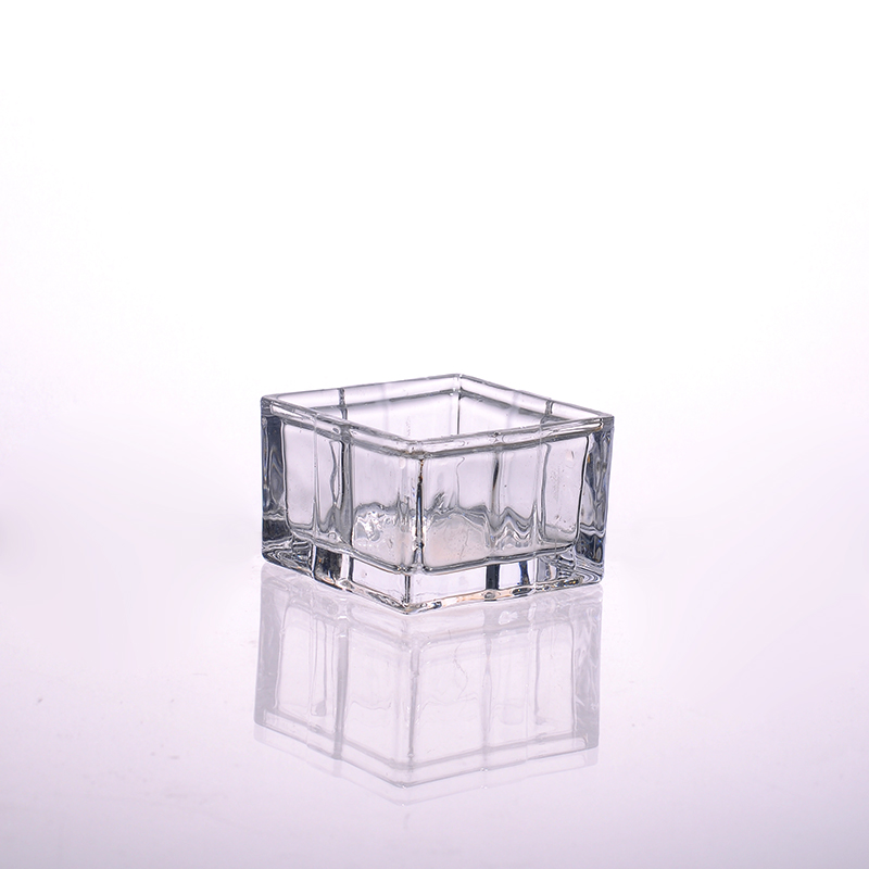 castiçais de vidro quadrado