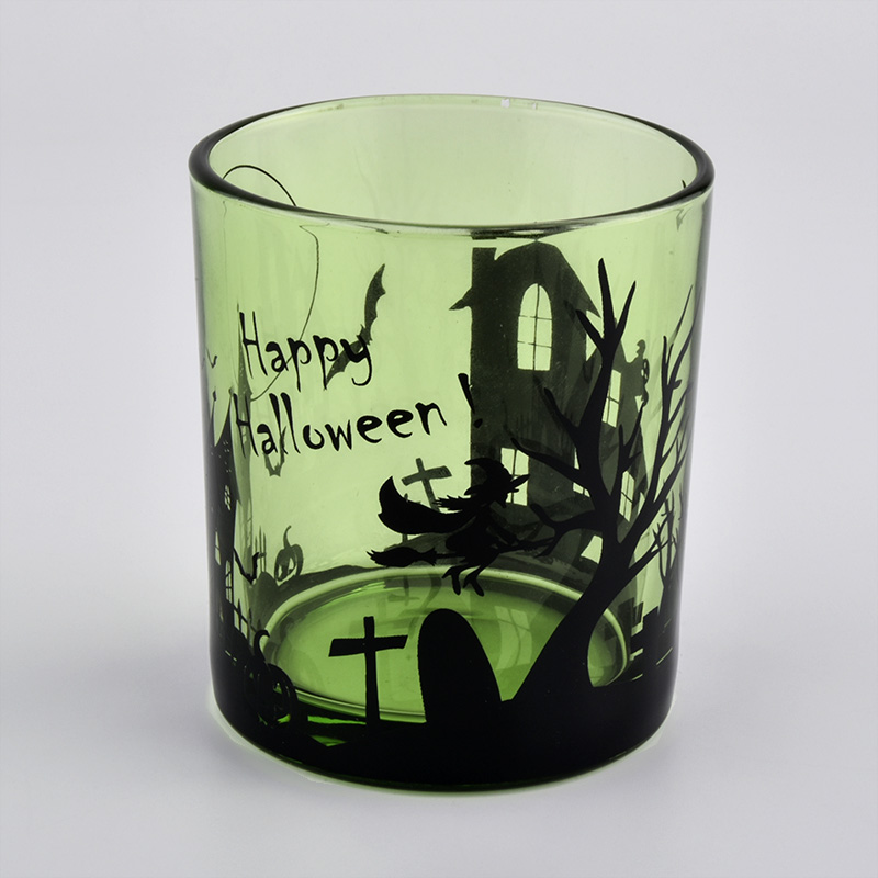 translucent glass candle containers with horrible Hallow picture