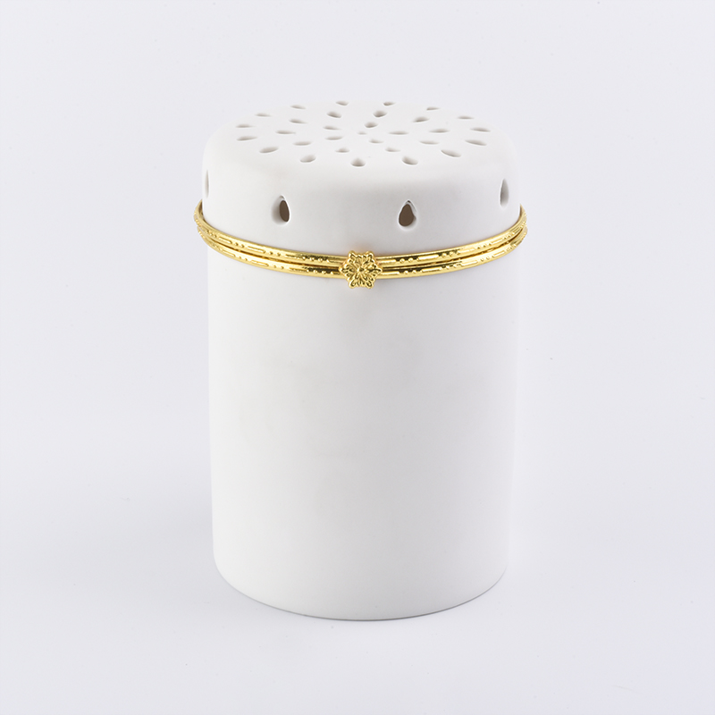 Tarro de vela de cerámica blanca con tapa hueca