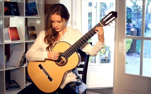 China What's the difference between a folk guitar and an electric box guitar? manufacturer