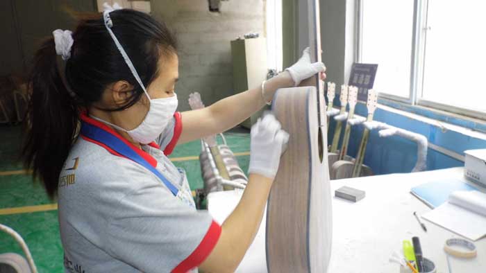 China GUTE GITARRE UM UNS Hersteller
