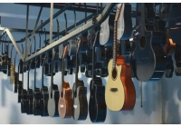 중국 Cross-border RMB "through train" service helps Guizhou Zhengan Guitar "go global" 제조업체